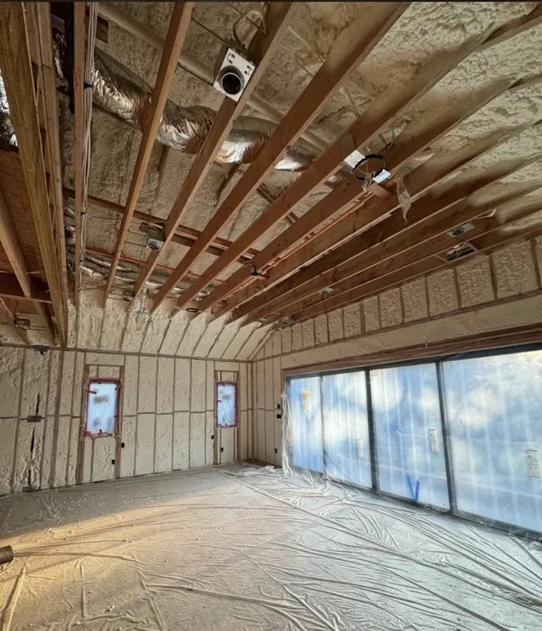 Interior walls and ceiling insulated with spray foam during new construction in La Grange